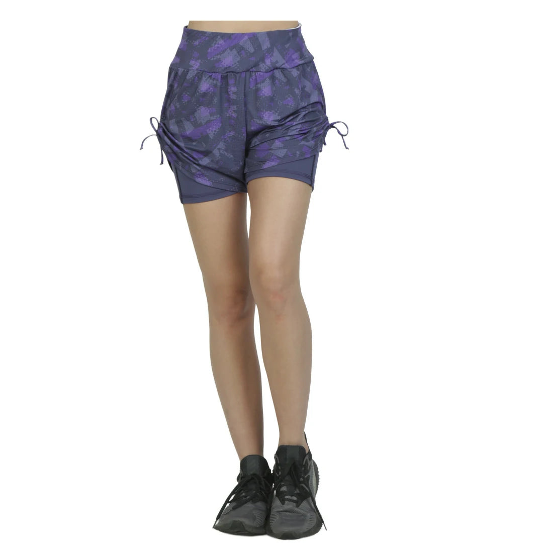 Short doble morado con short interior y bolsas UP AGAIN