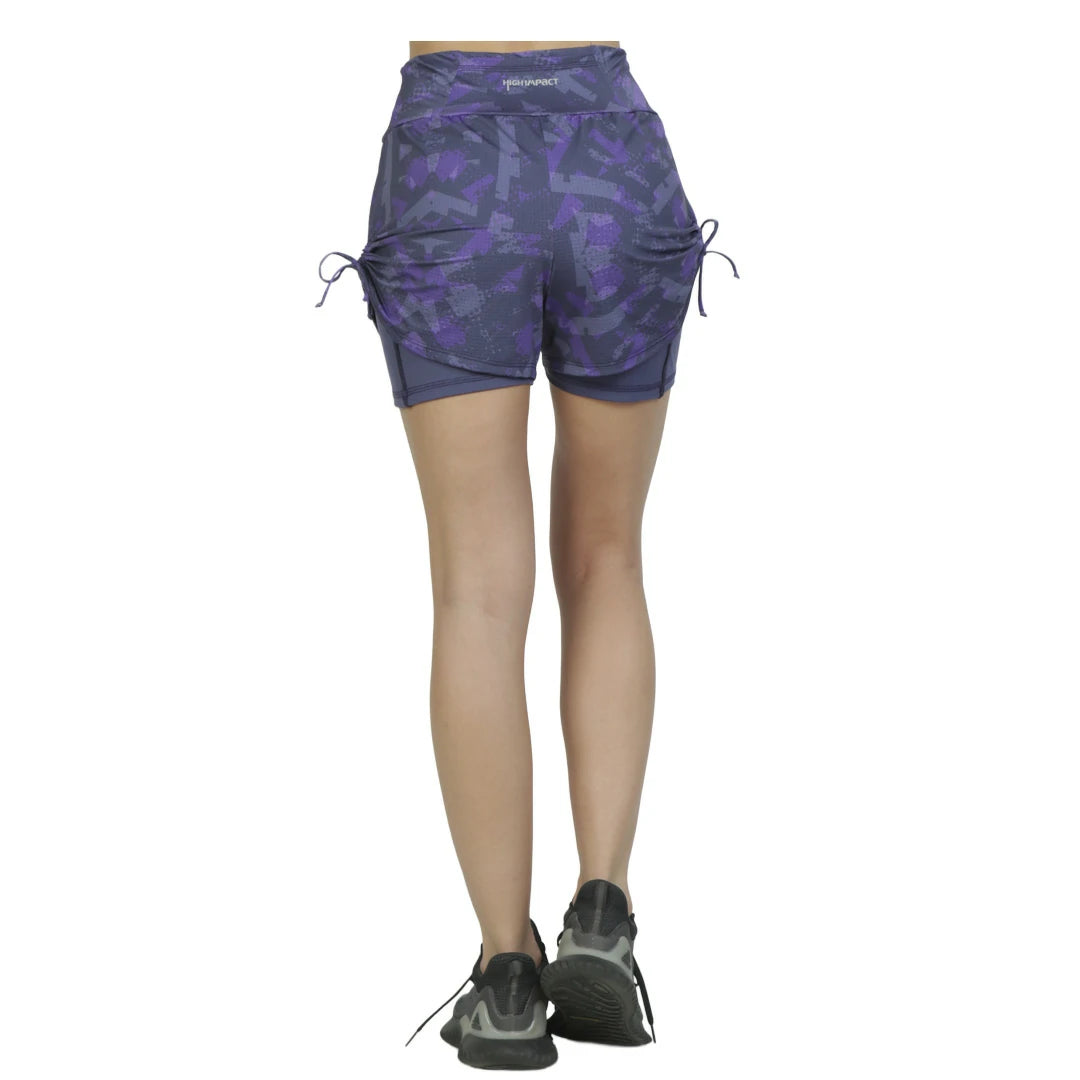 Short doble morado con short interior y bolsas UP AGAIN