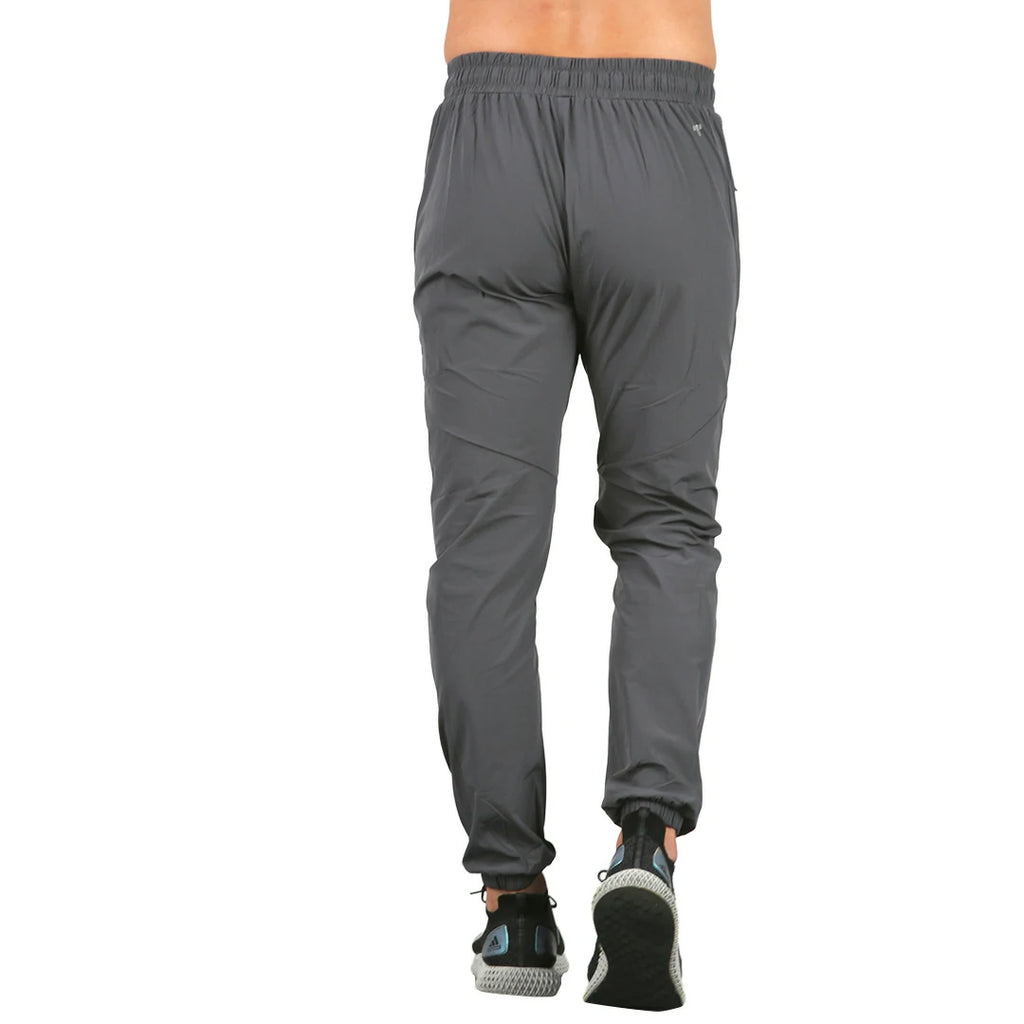 Set chamarra y pants rompevientos neutral ground GRIS